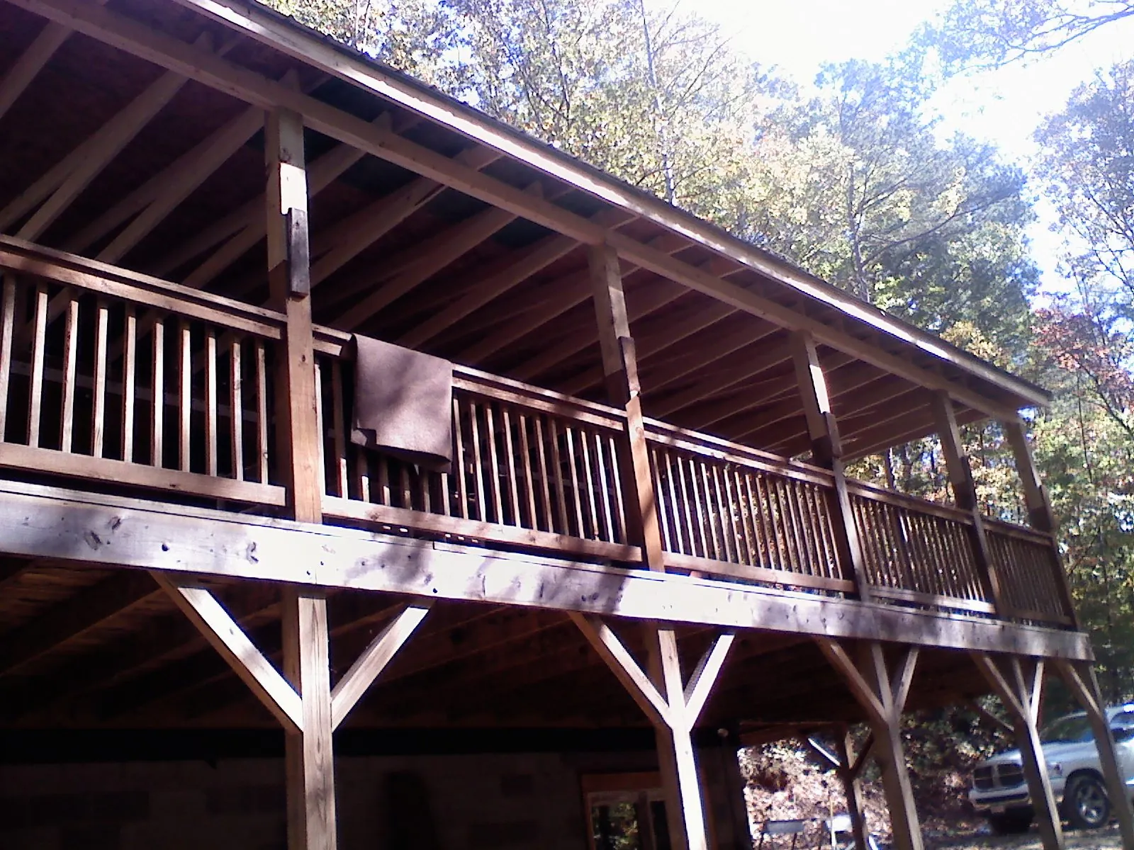 Timber framing under a new elevated porch and deck — Roof Leak Repair in Jay Em by Roofing Brothers